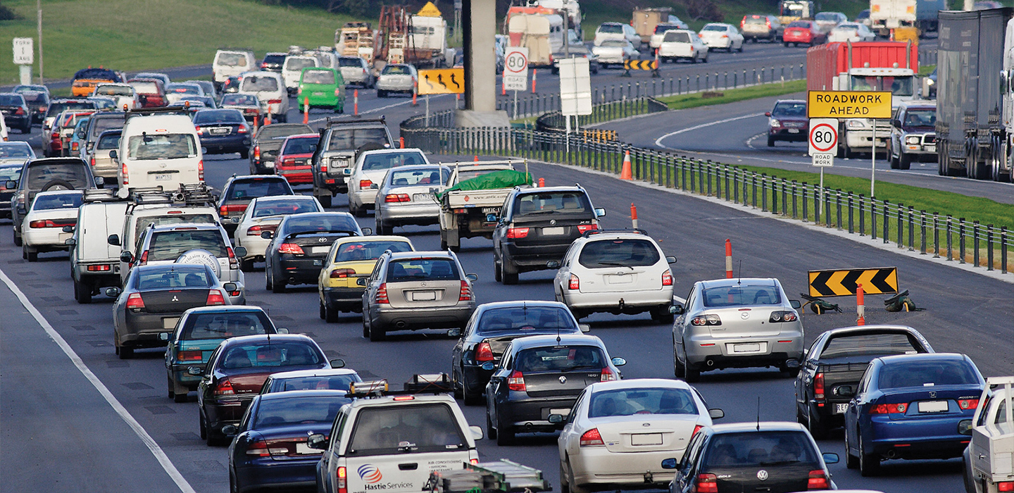 Cars in lots of traffic on a freeway