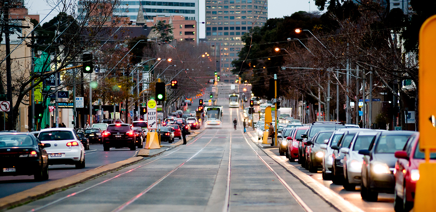 Cars driving in the city at night